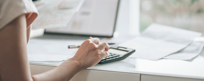 Woman calculating finances