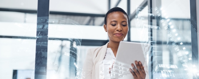 Woman smiling browsing tablet device