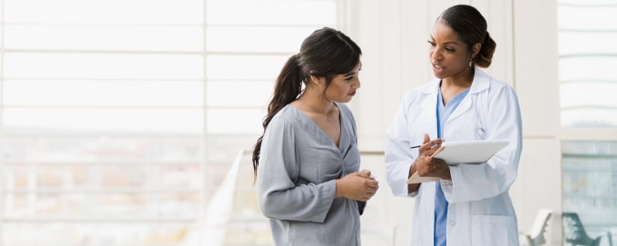 Doctor consulting with patient about healthcare