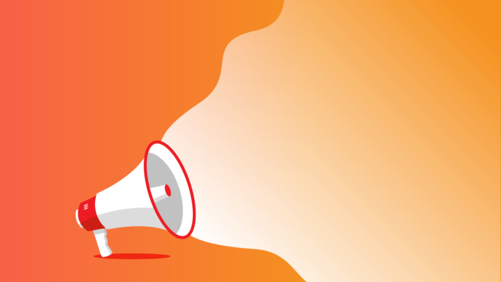 A white megaphone on and orange and white background